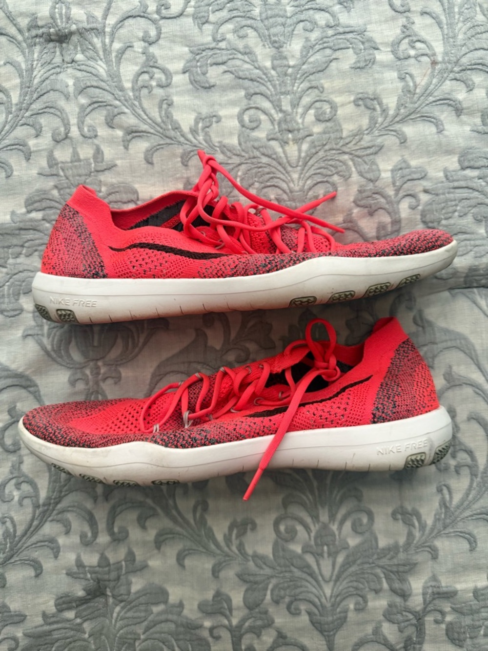 Nike Women’s Free RN Flyknit Athletic Shoes - Coral